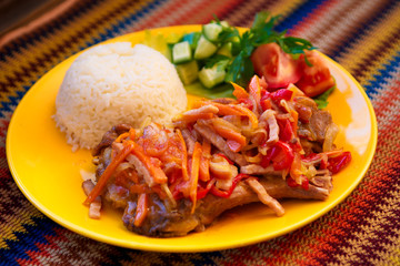 the rabbit baked with vegetables and rice