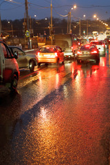 Obraz premium urban traffic in rainy night