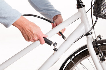 Securing the bike with a chain with a key