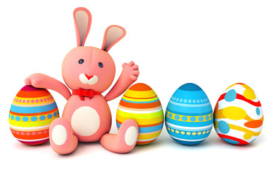 Fototapeta na wymiar Cute plush bunny sitting in the same row with easter eggs