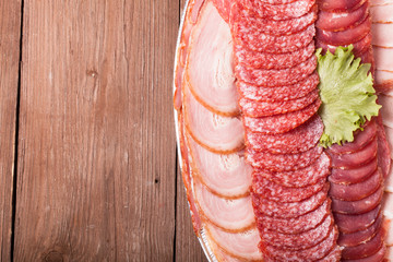 The background - detail of sliced salami.with space for text