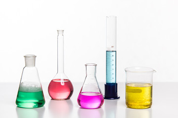 Glass in a chemical laboratory filled with colored liquid during