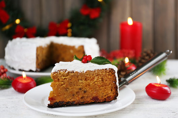 Slice of cake covered cream with Christmas decoration