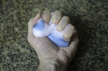 hand and sponge
