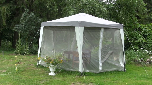 picnic tent in farm garden with mosquito protection
