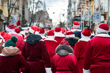 Procession of Santa Clauses. Santas