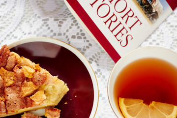 Apple pie and black tea with lemon