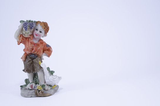 Boy with grape basket ornament isolated