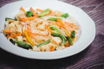 vegetarian pasta with carrot, zucchini