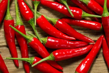 Fotobehang Red chili pepper background © gertrudda