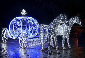 Decorative carriage with horses decorated with lights