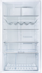 Interior of an open empty white fridge