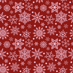 Snowflakes on red background seamless texture