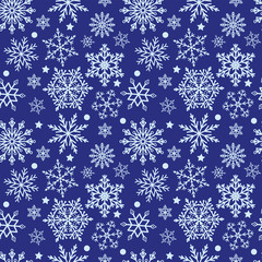 Snowflakes on blue background seamless texture