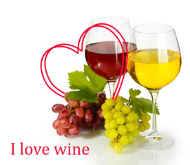 Glasses of wine and ripe grapes with heart-frame isolated