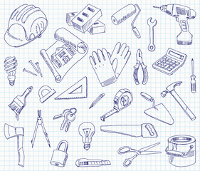 Freehand drawing building materials on a sheet of exercise book