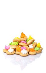 Belly button iced gem biscuits over white background