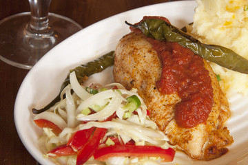 chicken fillet with mashed potato and lettuce