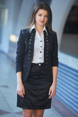 Young business woman in the hallway