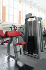 Fototapeta premium Interior of a fitness hall with fitness equipment