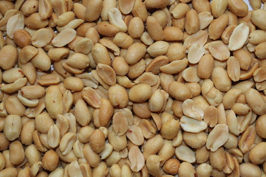 Scattered roasted and salted peanuts