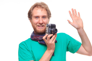 Portret of funny cheerful photographer with camera