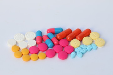 Fototapeta na wymiar Spilled pills of drug or alimentary supplement..