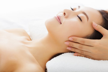 Fototapeta na wymiar massage of face for woman in spa salon
