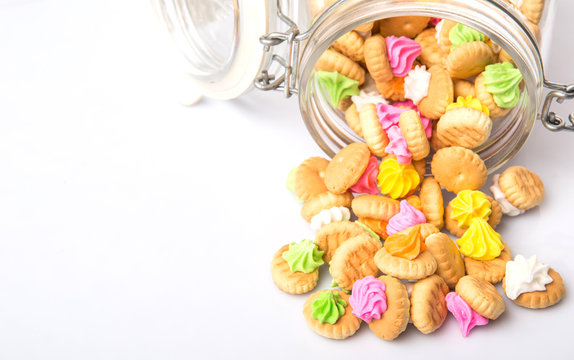 Belly button iced gem biscuits over white background