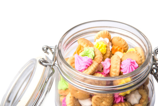 Belly button iced gem biscuits over white background
