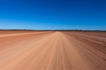 Fototapeta na wymiar Road through the desert in outback Australia.