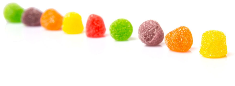 Colorful mix sugar jelly candy over white background