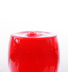 Pouring red wine in glass