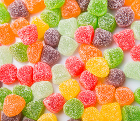 Colorful mix sugar jelly candy over white background
