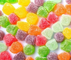 Colorful mix sugar jelly candy over white background