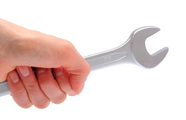 Hand of woman with wrench on white background