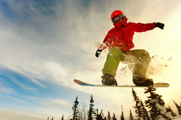 Snowboarder jumping