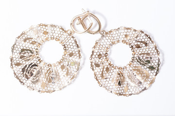 gold earrings delicate macro