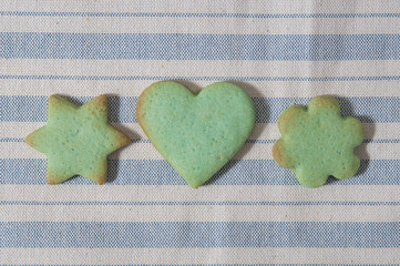 Green butter cookies, heart, flower and star shaped