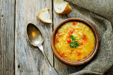 soup with salmon, potatoes and millet
