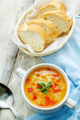 soup with salmon, potatoes and millet