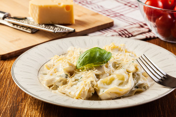 Italian tortellini in cream sauce