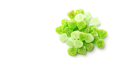 Green colored sugar jelly candy over white background