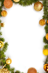 Christmas decoration with yellow ornamentals and green fir tree