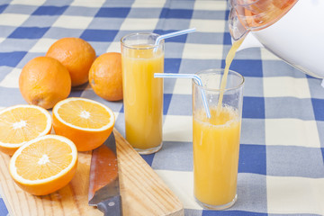 Pouring orange juice