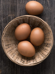 rustic farm fresh chicken egg in basket