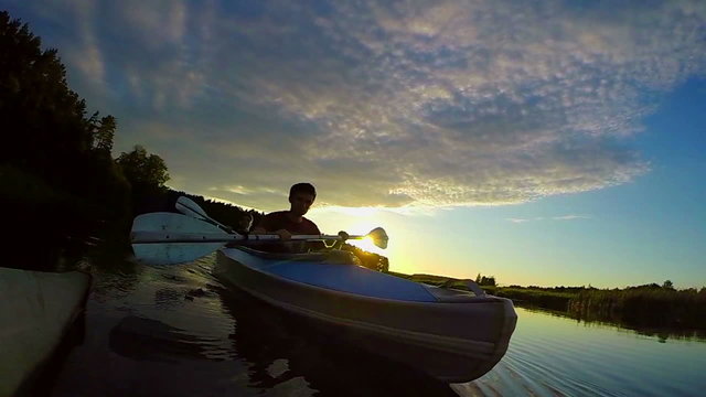 Two guys kayaking at sunset, sport, action camera, traveling