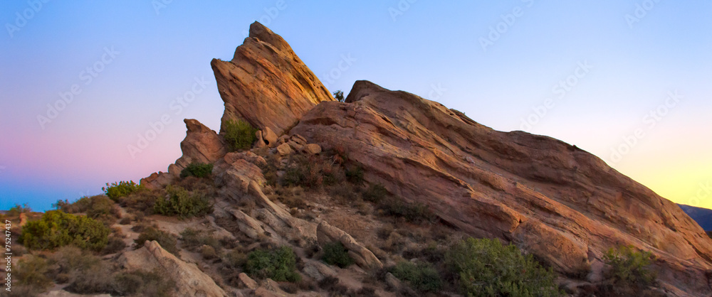 Wall mural panoramic view of vasquez rocks at sunset