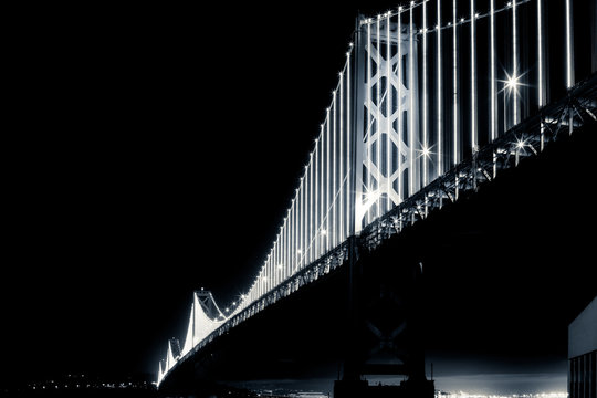 Fototapeta San Francisco Bay Bridge at Night in Black and White