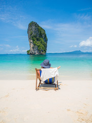 Man relaxing on the beach in Thailand